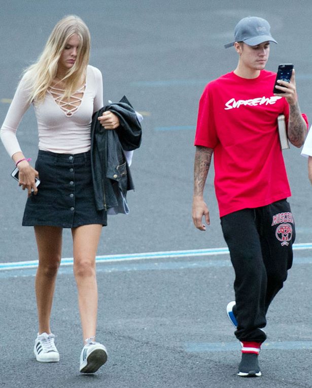 Justin-Bieber-and-Bronte-Blampied-at-Battersea-Heliport-to-take-a-helicopter-to-V-festival