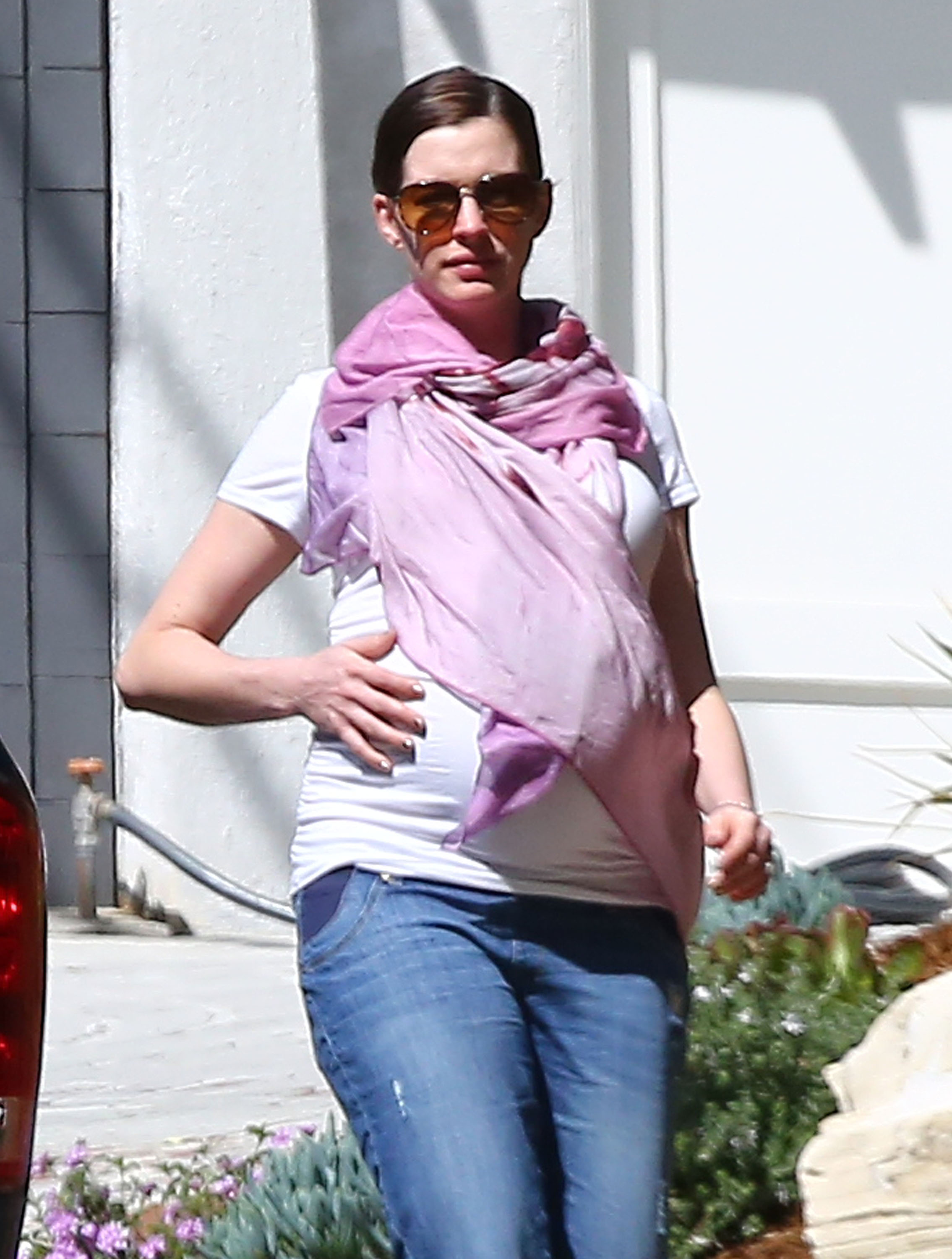 Exclusive... 51984531 Pregnant Anne Hathaway shows off her massive baby bump while out for a stroll in Los Angeles, California on March 1, 2016. Anne is expecting her first child with husband Adam Shulman FameFlynet, Inc - Beverly Hills, CA, USA - +1 (310) 505-9876