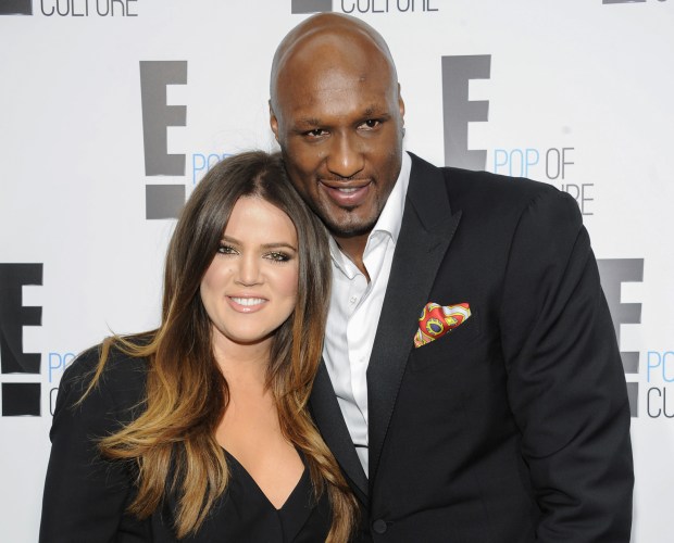 FILE - In this April 30, 2012, file photo, Khloe Kardashian Odom and Lamar Odom from the show "Keeping Up With The Kardashians" attend an E! Network upfront event at Gotham Hall in New York. A Los Angeles judge on Friday, Dec. 9, 2016, finalized Kardashian and Odom's divorce nearly three years after she first filed to end their marriage. The pair were married in September 2009 and court records show many financial details of the divorce were subject to a prenuptial agreement. (AP Photo/Evan Agostini, File)